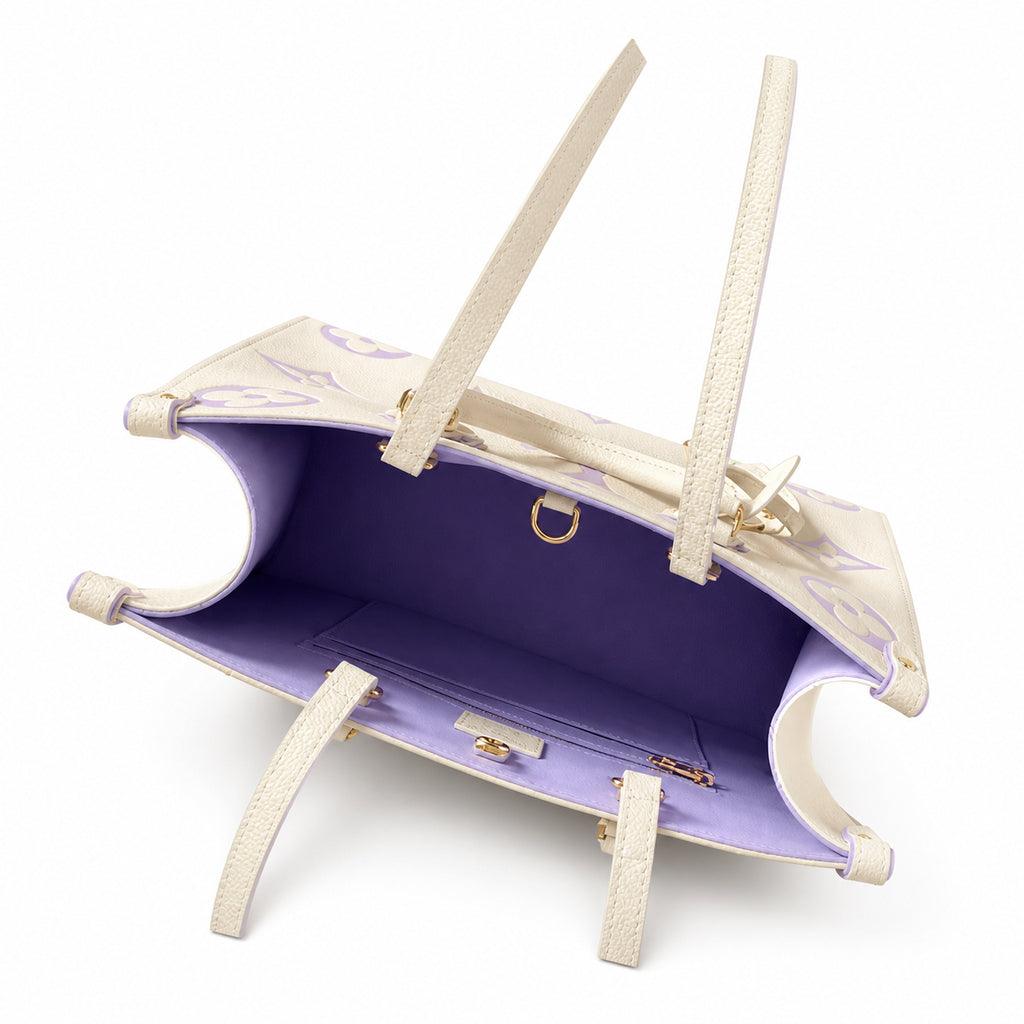 Louis Vuitton OnTheGo MM — Monogram Empreinte Leather in Crème with Lavender Trim & Interior