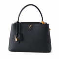 Louis Vuitton Capucines MM — Taurillon Leather in Noir with Gold LV Lock & Vachetta Trim