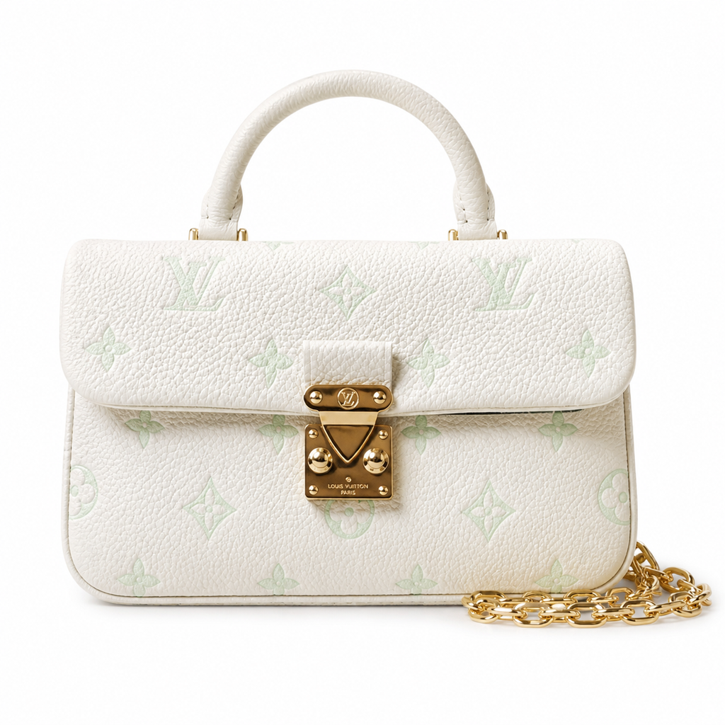 Louis Vuitton Madeleine BB — Monogram Empreinte Leather in Crème with Gold LV Lock