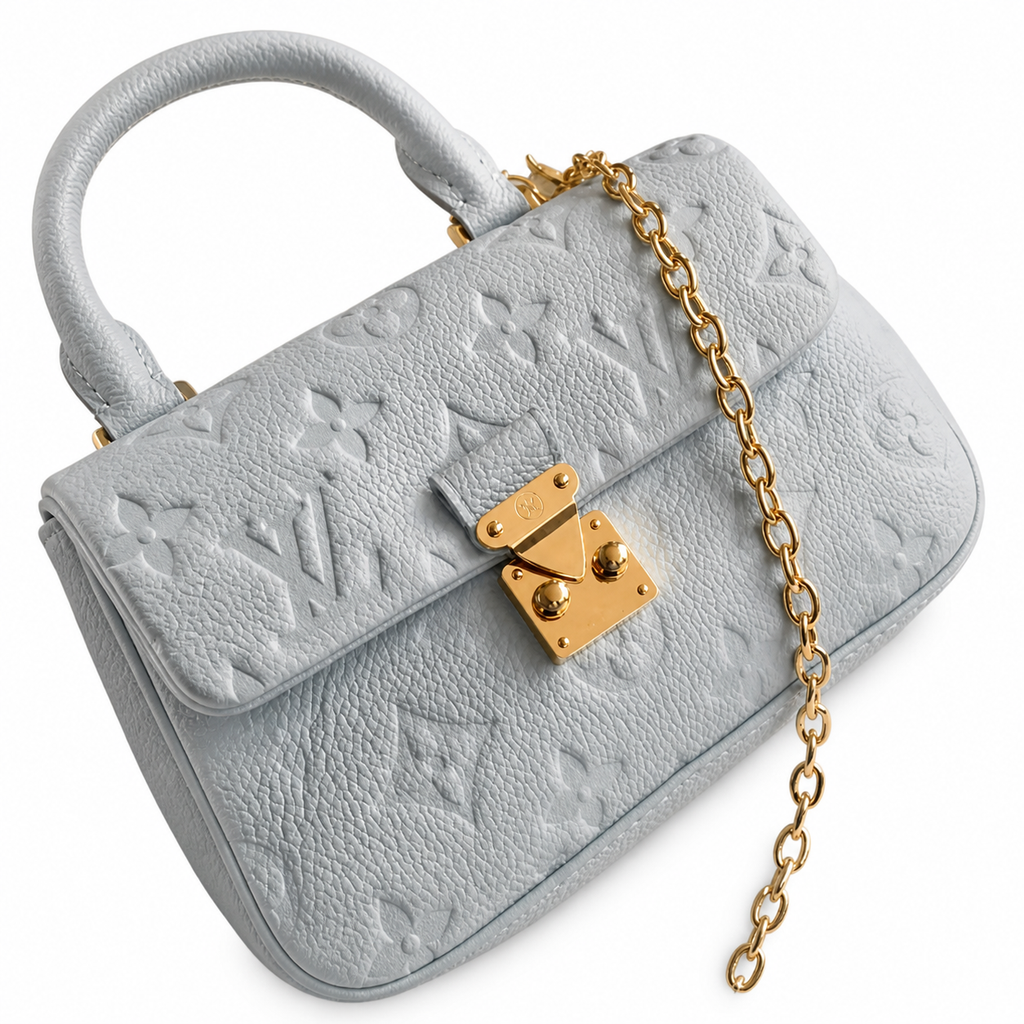 Louis Vuitton Madeleine BB — Monogram Empreinte Leather in Bleu Glacier with Gold LV Lock