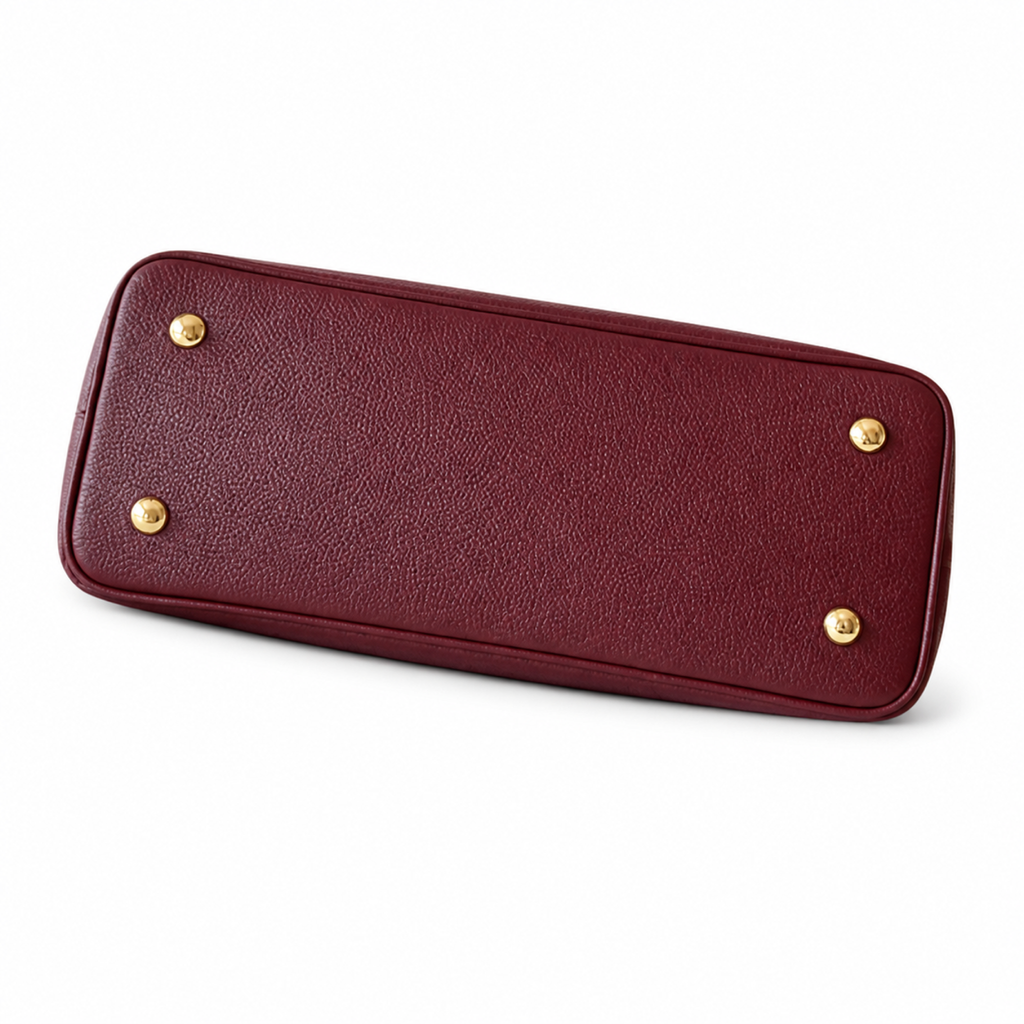 Louis Vuitton Capucines MM — Taurillon Leather in Bordeaux with Gold LV Lock