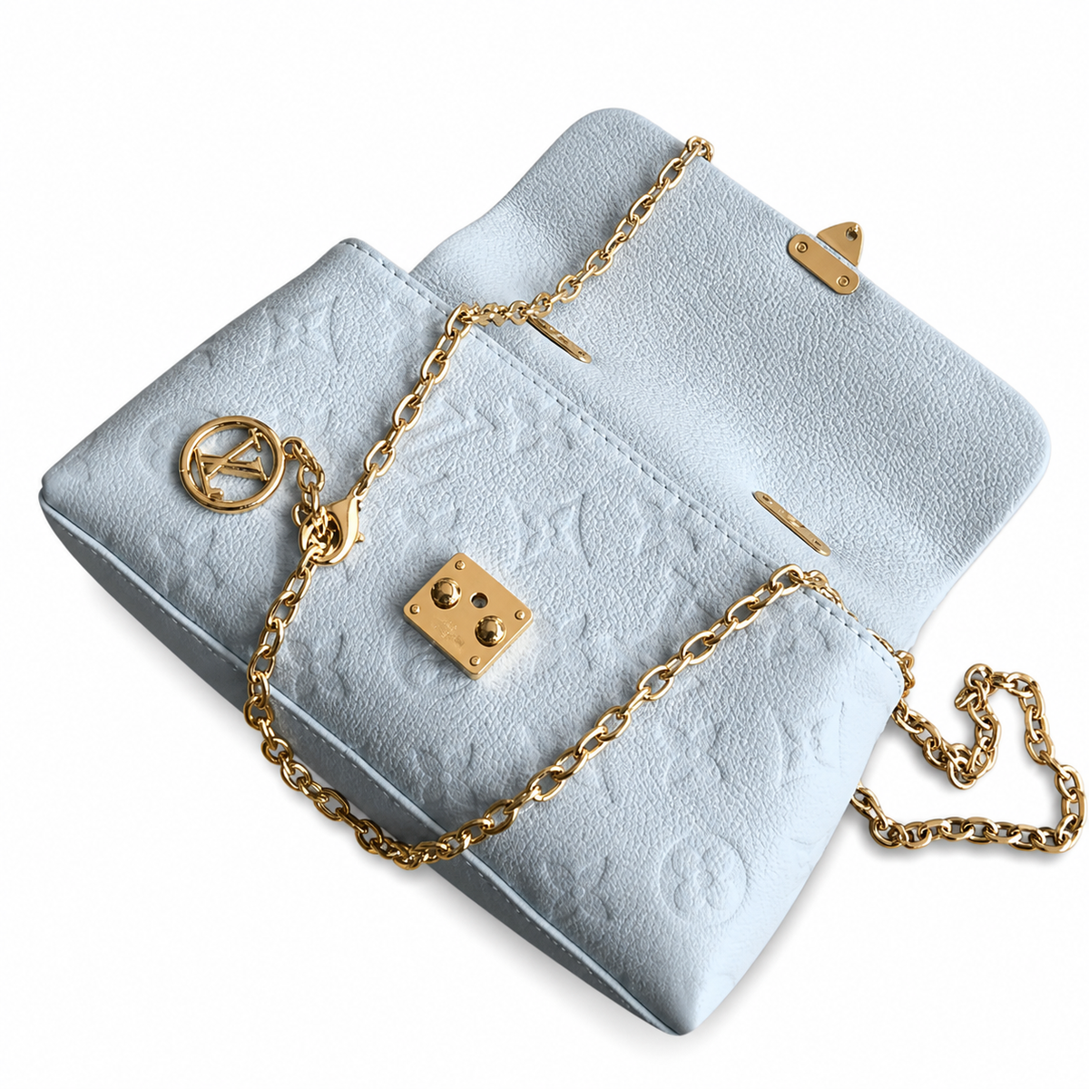 Louis Vuitton Madeleine BB — Monogram Empreinte Leather in Bleu Glacier with Gold LV Lock