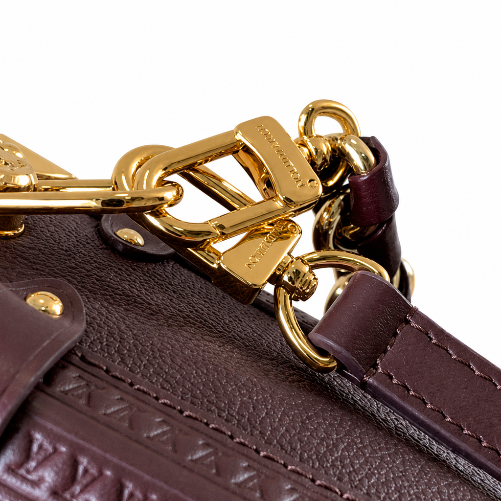 Louis Vuitton Side Trunk MM — Prune Aubergine Empreinte, Leather-Woven Chain Handle, Corner Guards & Zipper