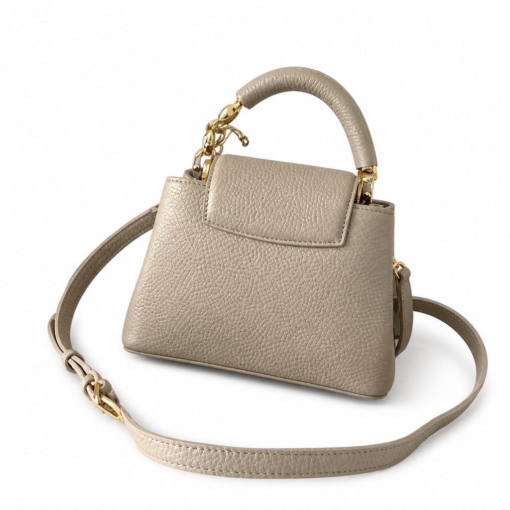 Louis Vuitton Capucines Mini — Taurillon Leather in Tourterelle with Gold Chain Handle & Flower Lock