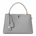 Louis Vuitton Capucines MM — Taurillon Leather in Galet with Gold LV Lock