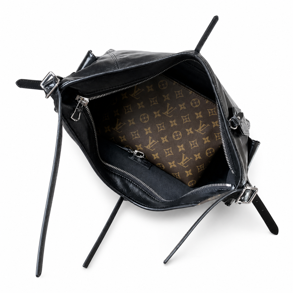 Louis Vuitton Melie — Noir Smooth Calfskin, Central Leather Bow, Side Ties & Monogram Luggage Tag