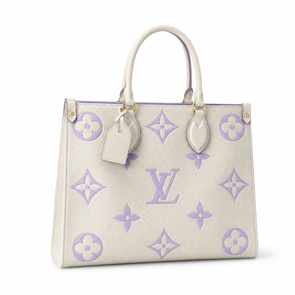 Louis Vuitton OnTheGo MM — Monogram Empreinte Leather in Crème with Lavender Trim & Interior