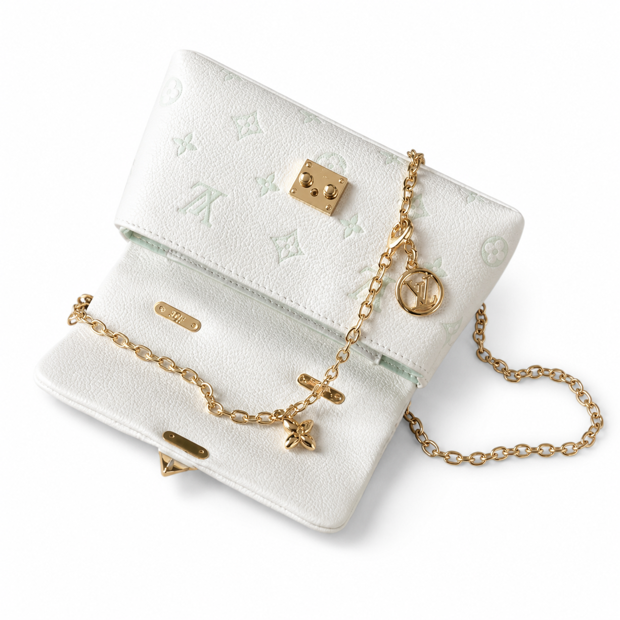 Louis Vuitton Madeleine BB — Monogram Empreinte Leather in Crème with Gold LV Lock