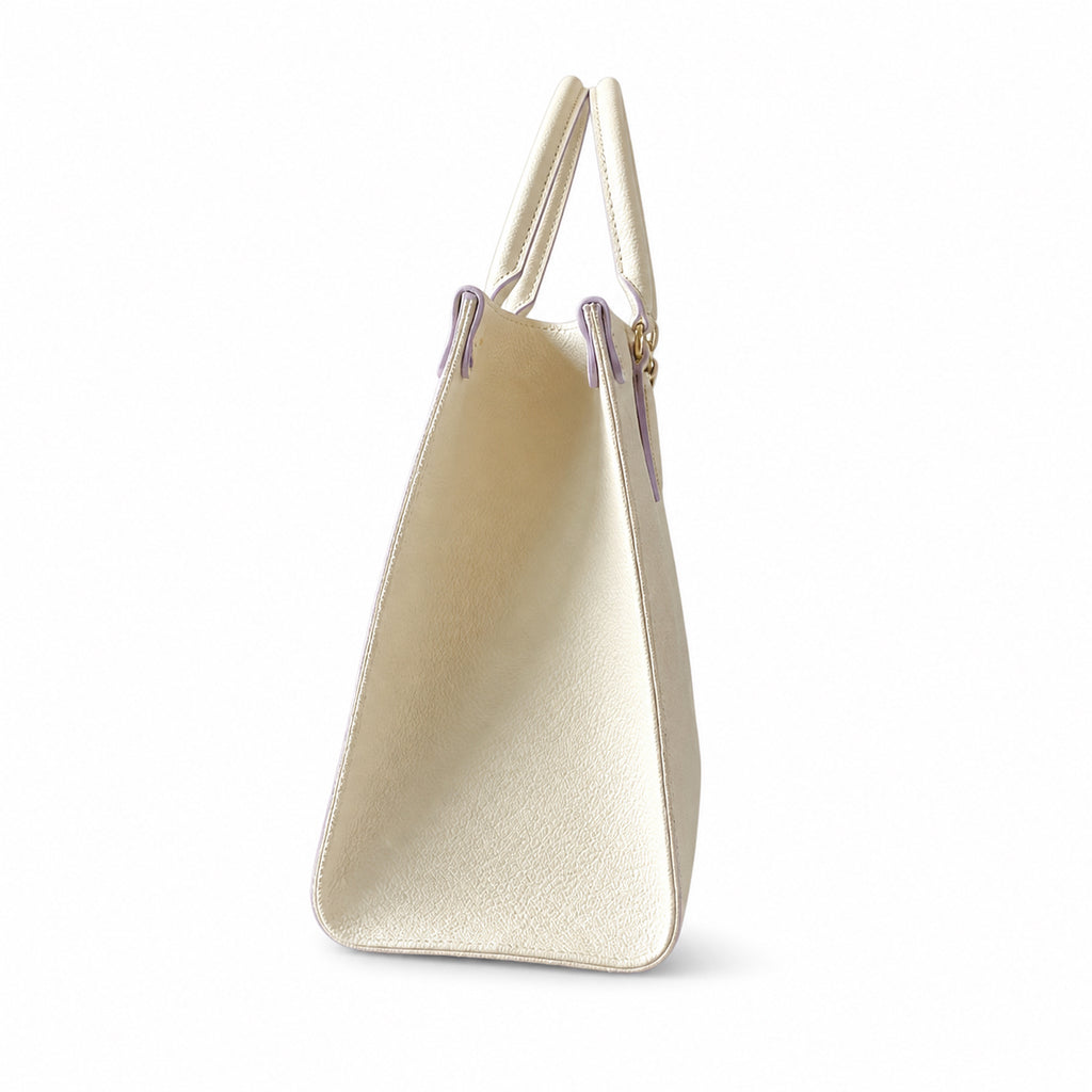Louis Vuitton OnTheGo MM — Monogram Empreinte Leather in Crème with Lavender Trim & Interior