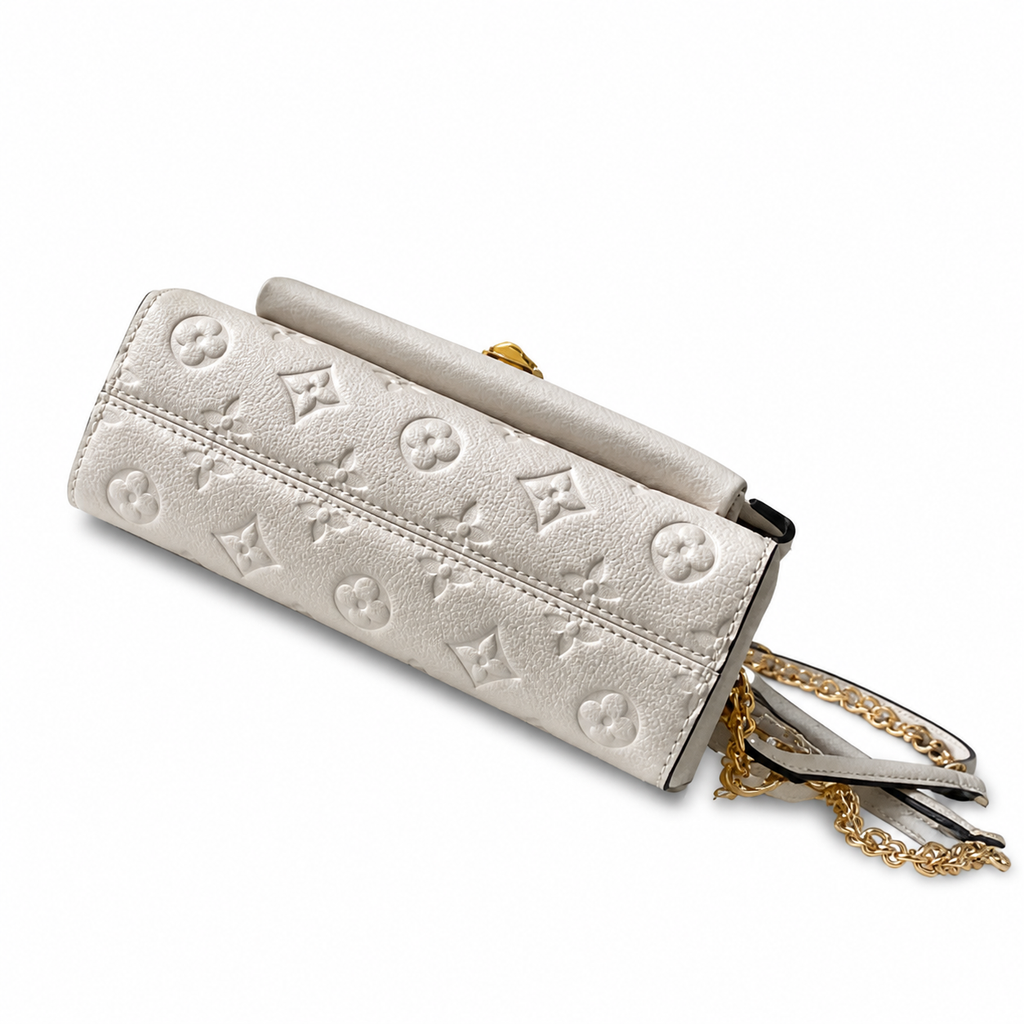 Louis Vuitton Vavin BB — Monogram Empreinte Leather in Crème