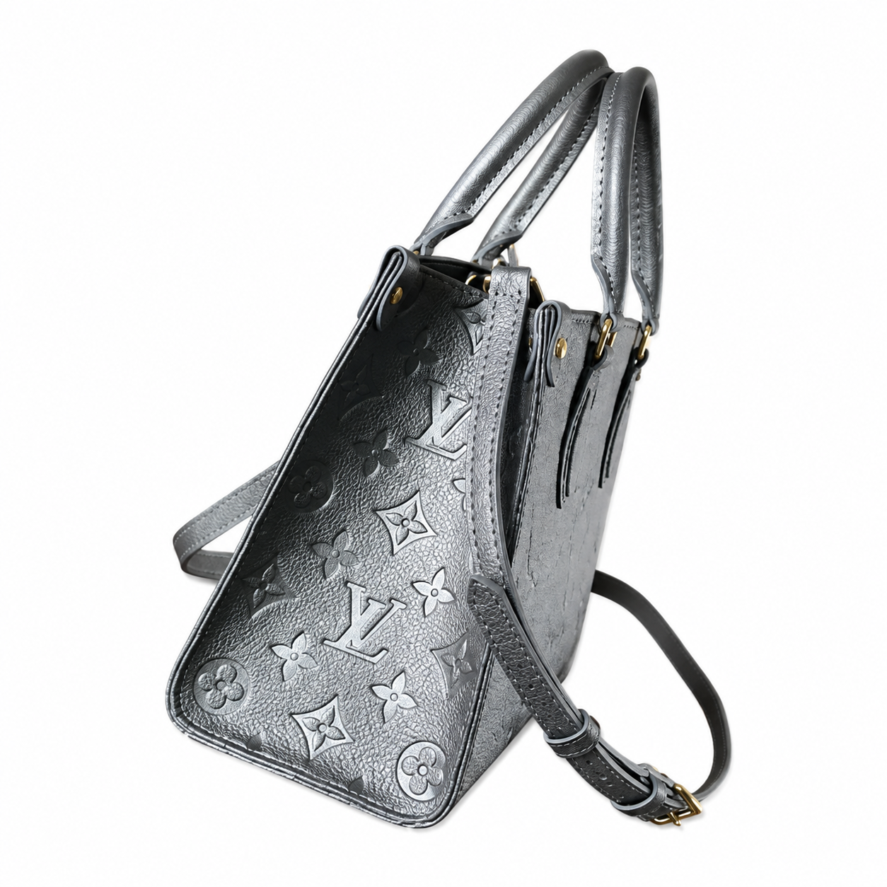 Louis Vuitton Pochette Métis East West — Argent Metallic Giant Empreinte & Wrist Strap