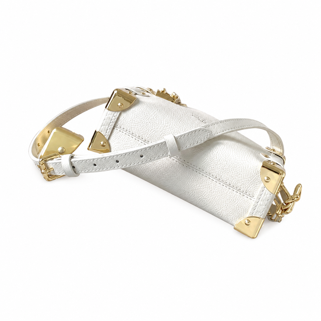 Louis Vuitton Petite Malle Souple — Blanc Empreinte, Gold Corner Fittings & Leather Strap
