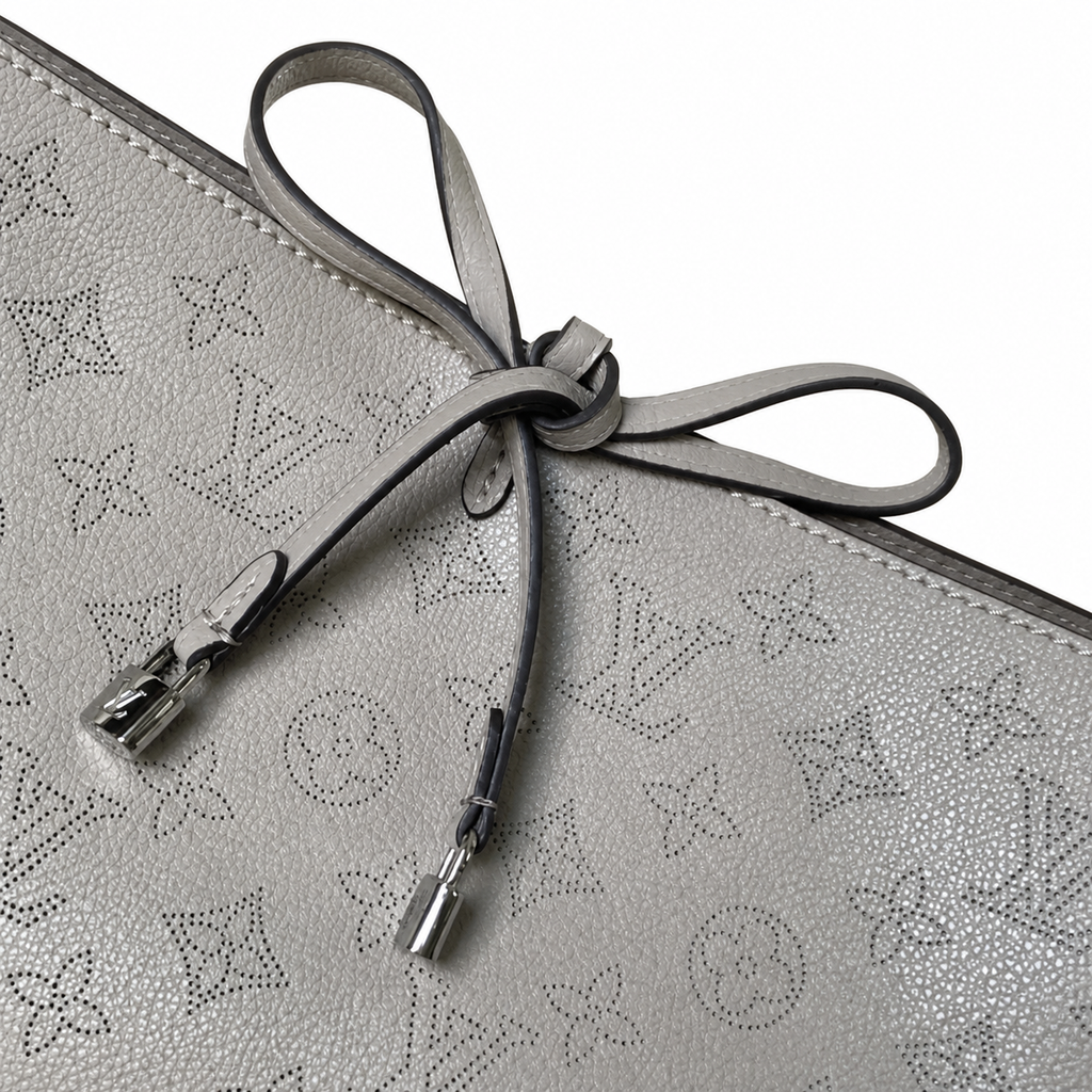 Louis Vuitton Mahina Bucket — Galet Grey Perforated Calfskin, Laser-Cut Monogram & Silver Hardware