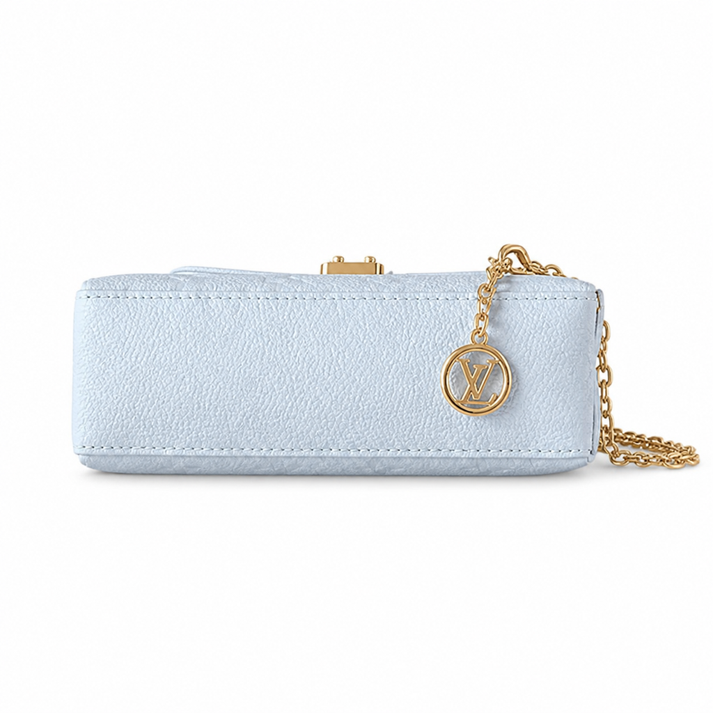 Louis Vuitton Madeleine BB — Monogram Empreinte Leather in Bleu Glacier with Gold LV Lock