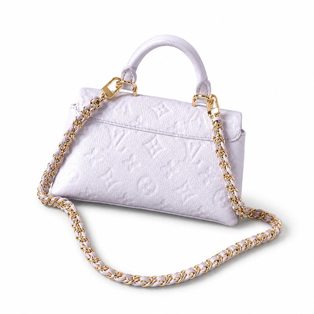 Louis Vuitton Madeleine BB — Monogram Empreinte Leather in Lilas with Gold LV Lock
