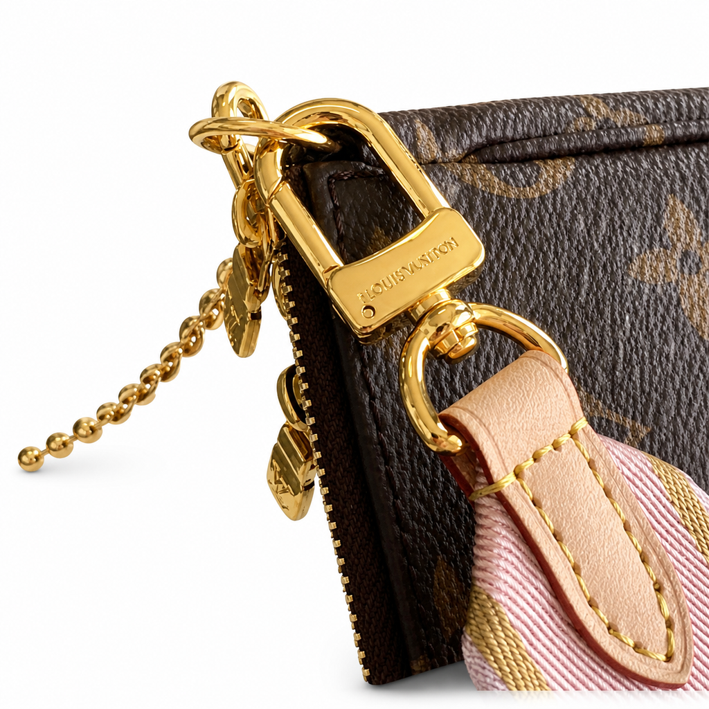 Louis Vuitton Pochette Accessoires — Monogram Canvas with Rose Pink Logo Strap