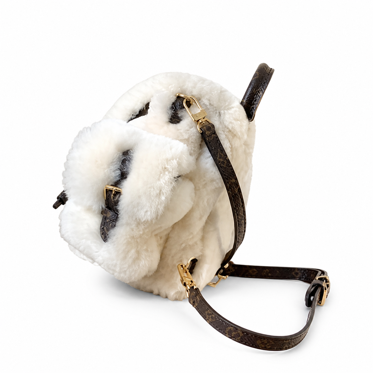 Louis Vuitton Monogram Heritage Petite Backpack