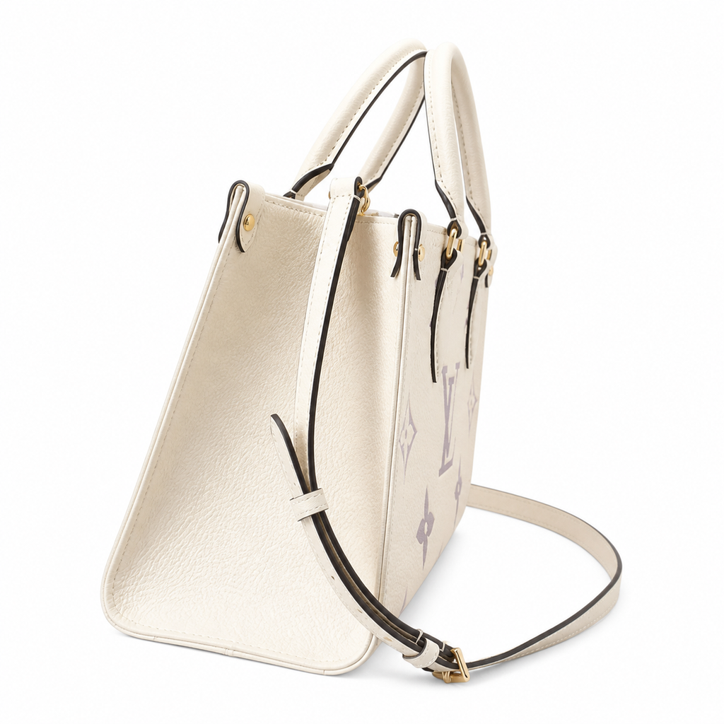 Louis Vuitton Onthego PM — Giant Monogram Empreinte in Crème & Dove Grey