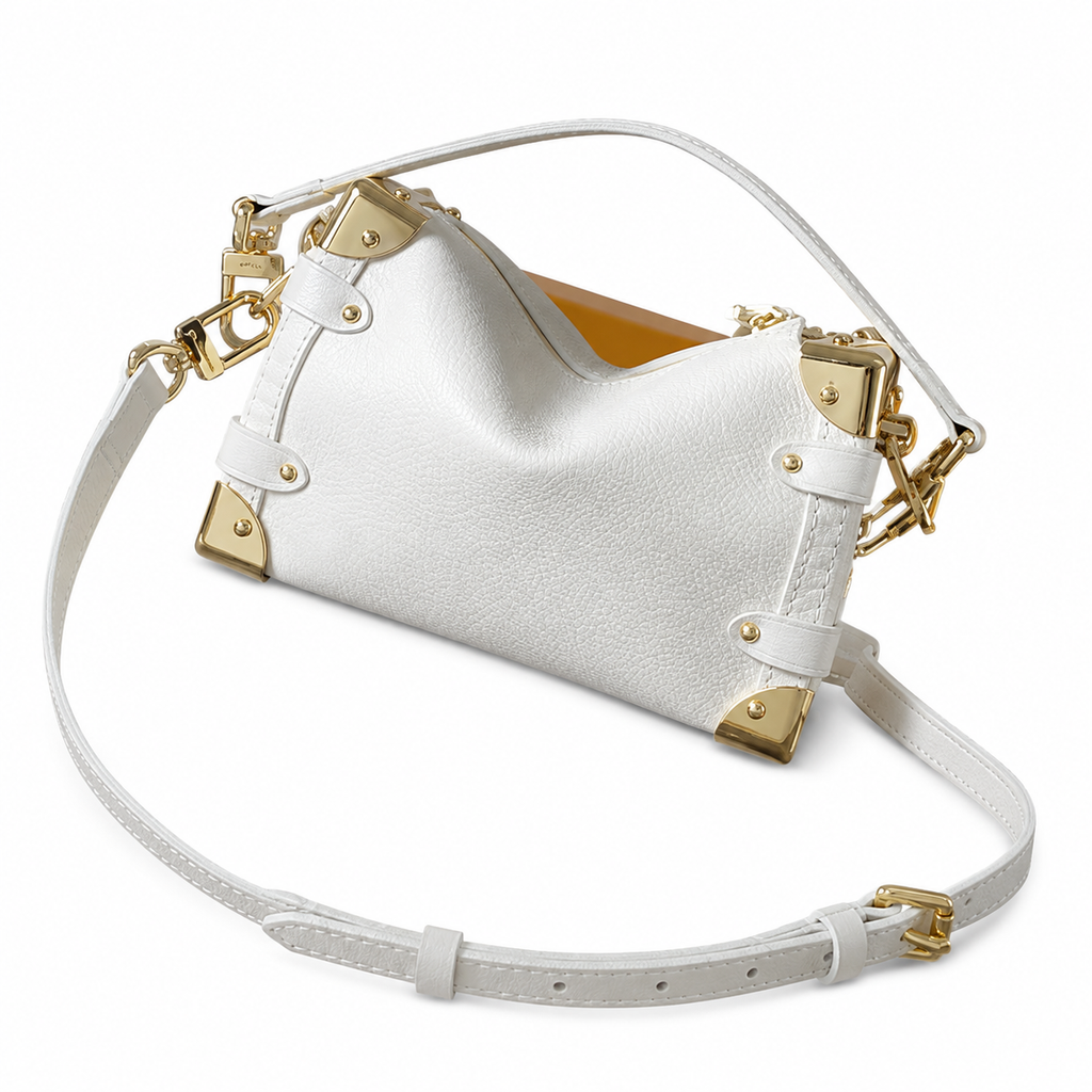 Louis Vuitton Petite Malle Souple — Blanc Empreinte, Gold Corner Fittings & Leather Strap