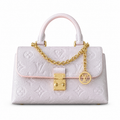 Louis Vuitton Dauphine Mini — Monogram Empreinte Leather in Rose Poudre with Gold Chain