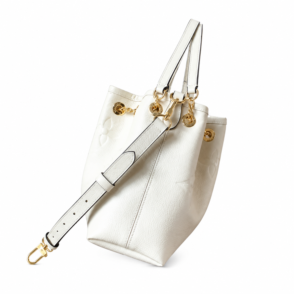 Louis Vuitton NéoNoé MM — Blanc Ivoire Empreinte, Braided Gold Drawstring & Black Handles