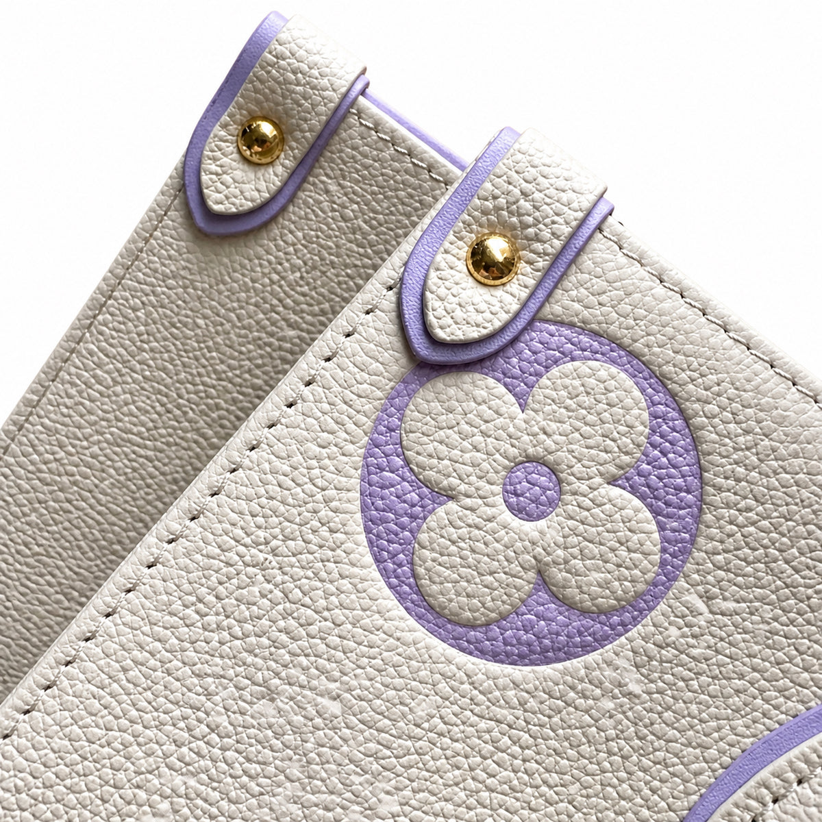 Louis Vuitton OnTheGo MM — Monogram Empreinte Leather in Crème with Lavender Trim & Interior