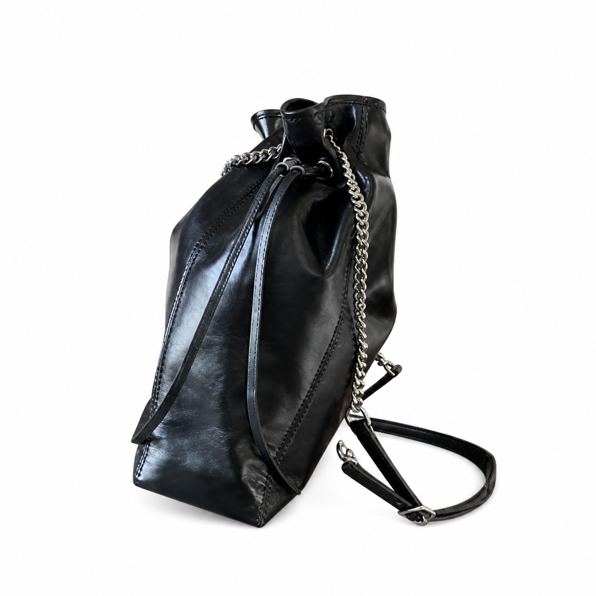 Saint Laurent Drawstring Bucket Bag — Noir Calfskin, Quatrefoil Chain Handle, Leather Drawstring & Tassel