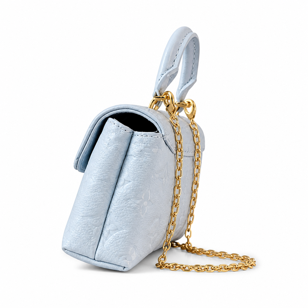 Louis Vuitton Madeleine BB — Monogram Empreinte Leather in Bleu Glacier with Gold LV Lock