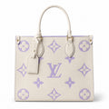 Louis Vuitton OnTheGo MM — Monogram Empreinte Leather in Crème with Lavender Trim & Interior