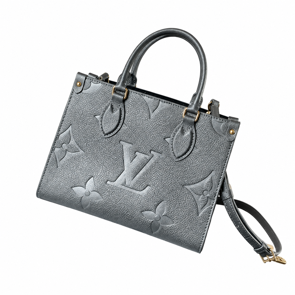 Louis Vuitton Pochette Métis East West — Argent Metallic Giant Empreinte & Wrist Strap