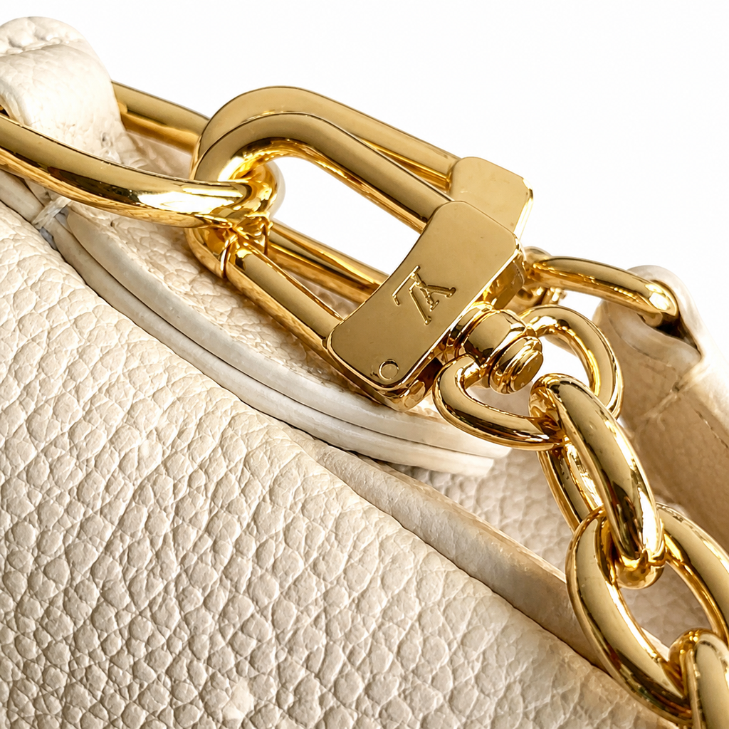Louis Vuitton Milla MM — Crème Ivoire Empreinte, LV Paris Nameplate, Gold Chain & Leather Shoulder Pad