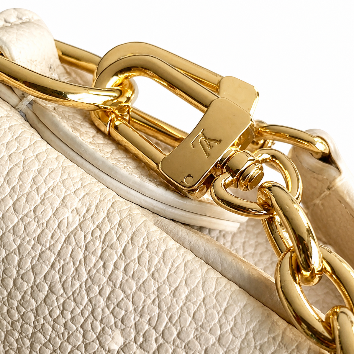 Louis Vuitton Milla MM — Crème Ivoire Empreinte, LV Paris Nameplate, Gold Chain & Leather Shoulder Pad