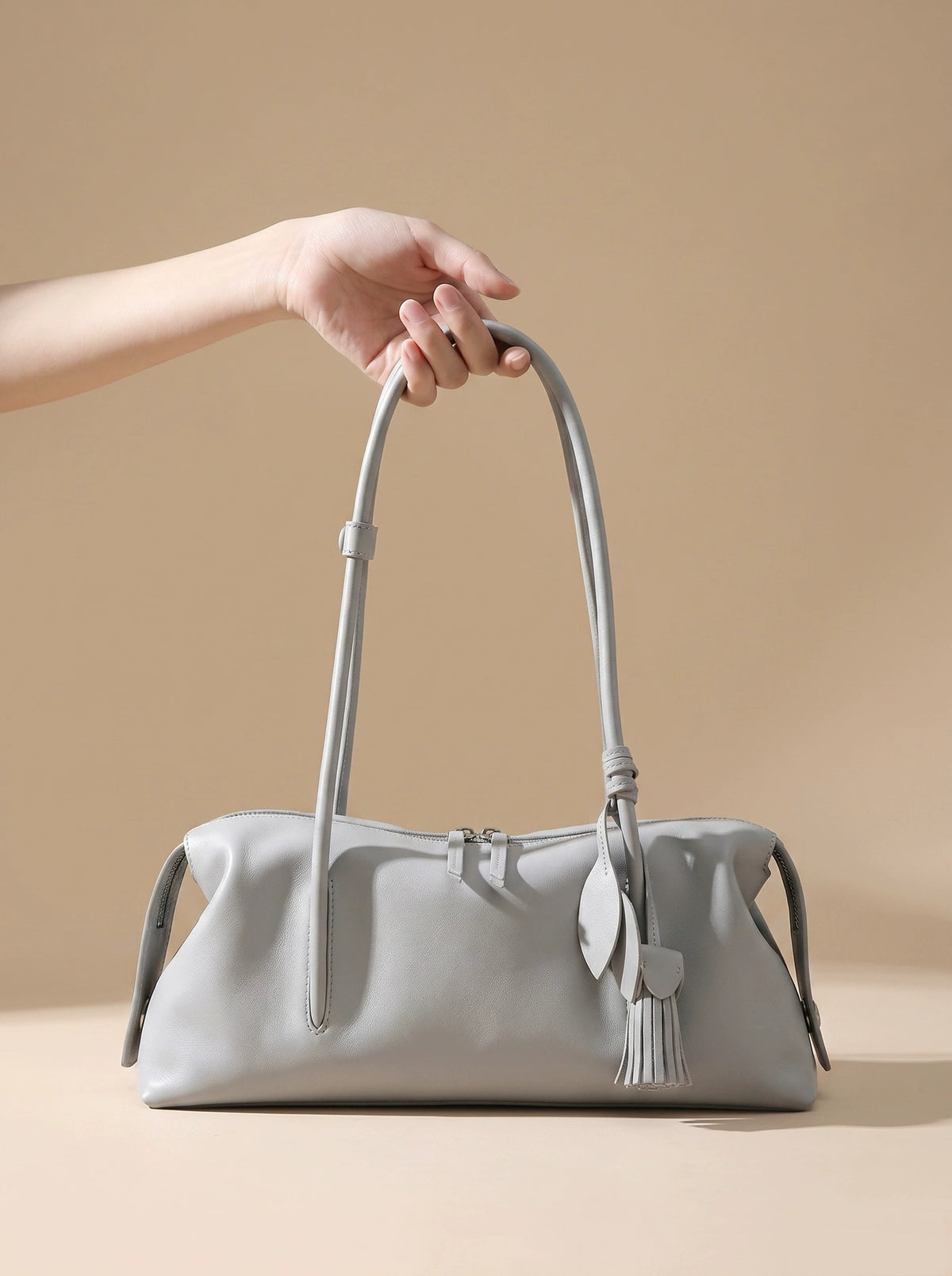 Dove Grey Soft Leather Pillow Shoulder Bag with Tassel Charm